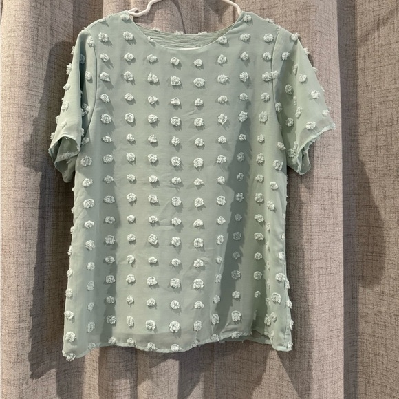 No longer fits, but really cute!! Mint green textured shirt. Size medium - Picture 2 of 3